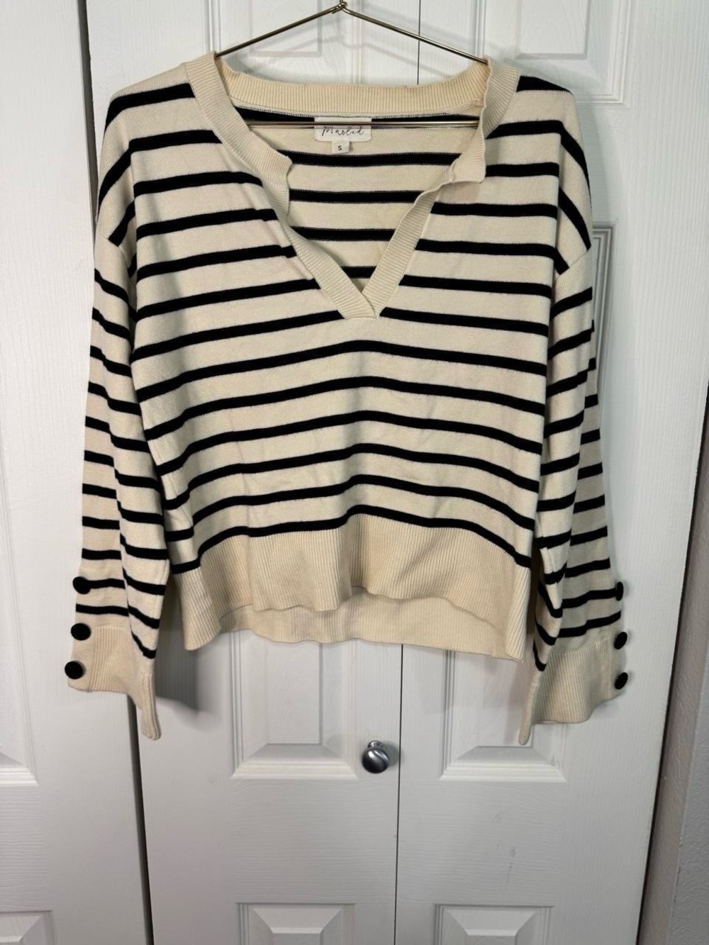 Striped Cream and Black V-Neck Sweater with Button Cuff Detail
